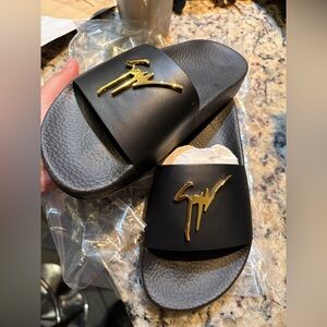 Giuseppe Zanotti Black Slide Sandals with Gold Signature Logo